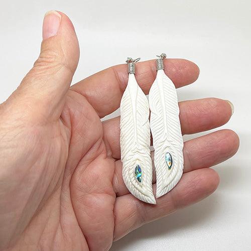 Intricately Carved Bone and Paua Shell Feather Earrings