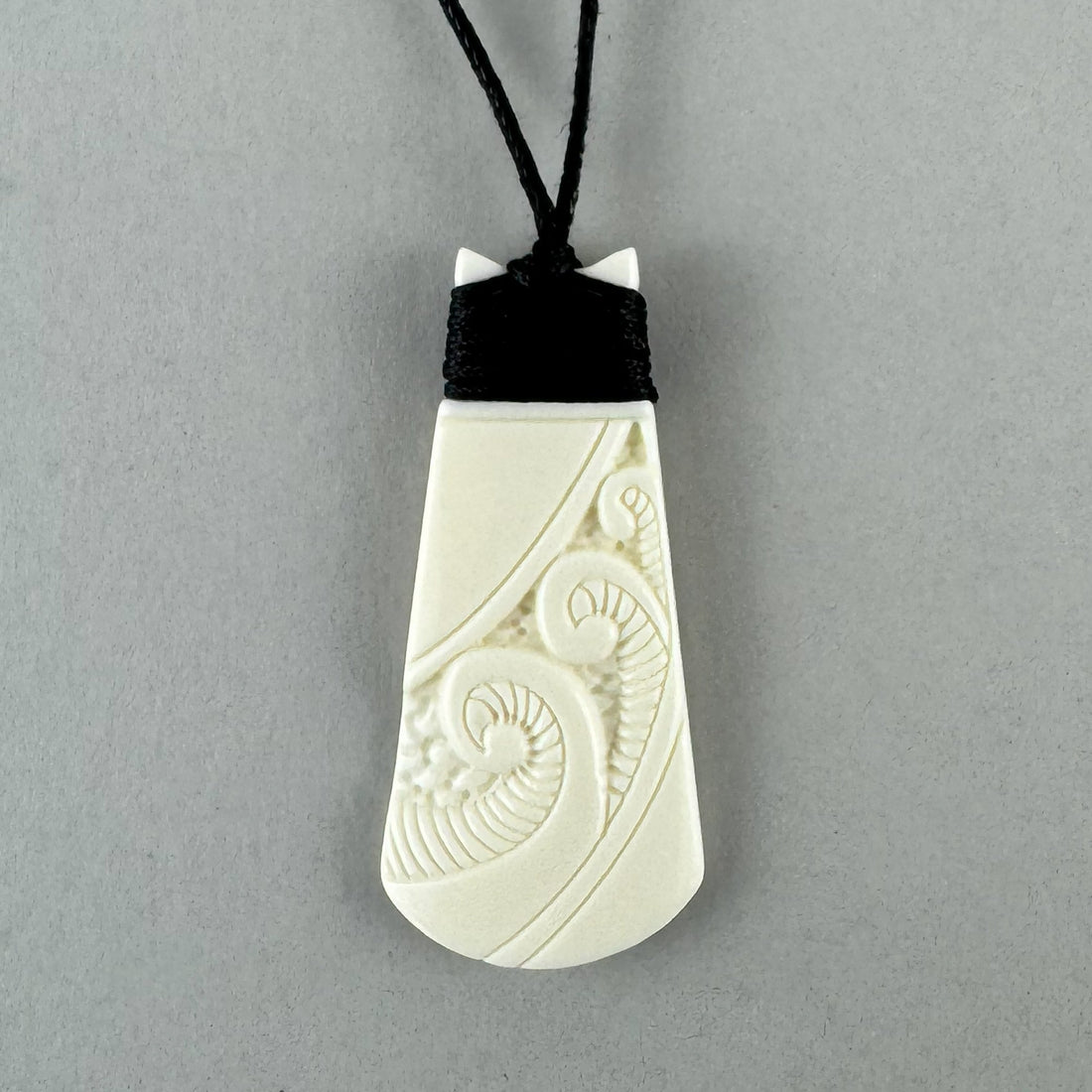 Beautiful Maori Bone Toki Necklace with Koru - ShopNZ