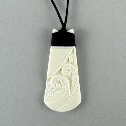 Beautiful Maori Bone Toki Necklace with Koru - ShopNZ