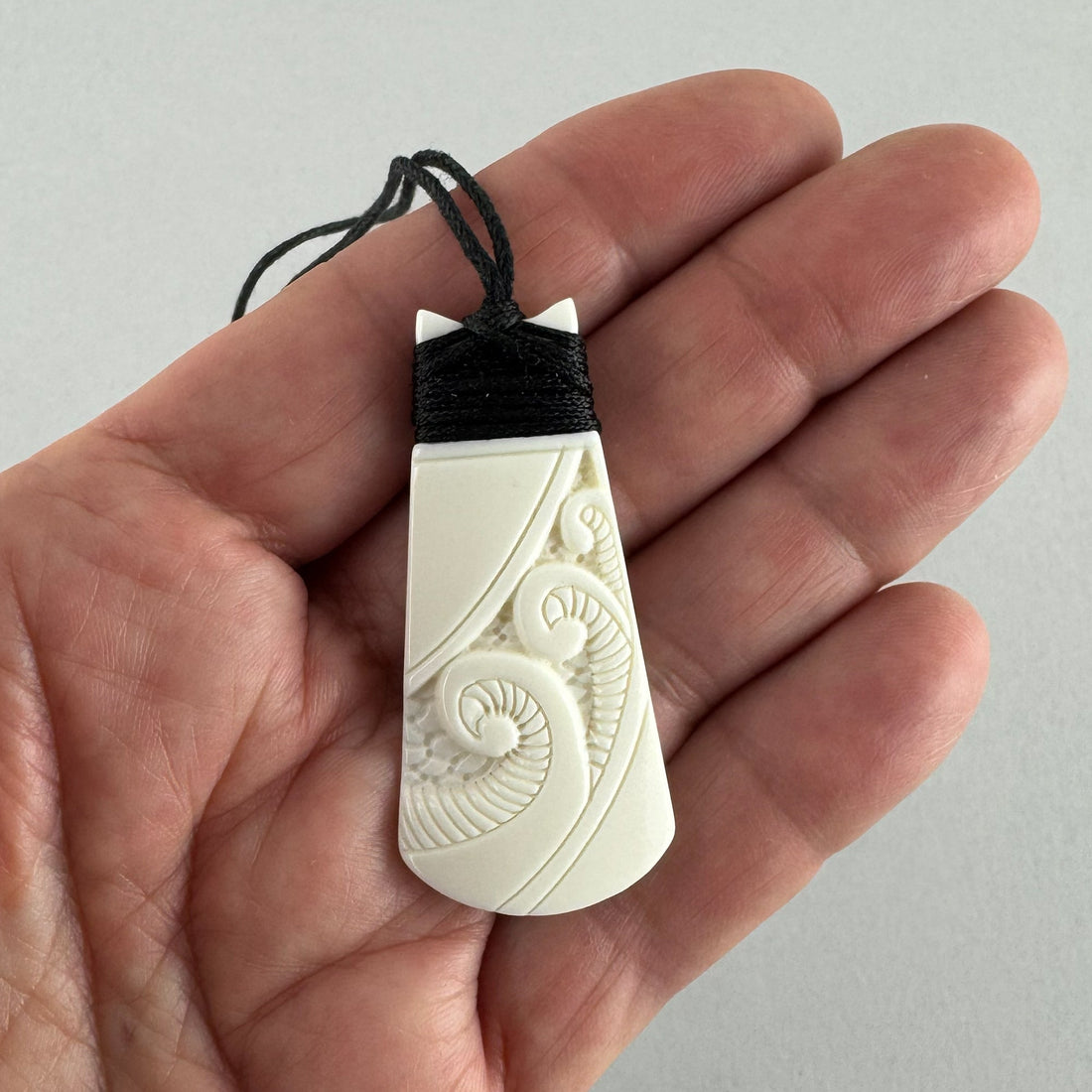 Beautiful Maori Bone Toki Necklace with Koru - ShopNZ