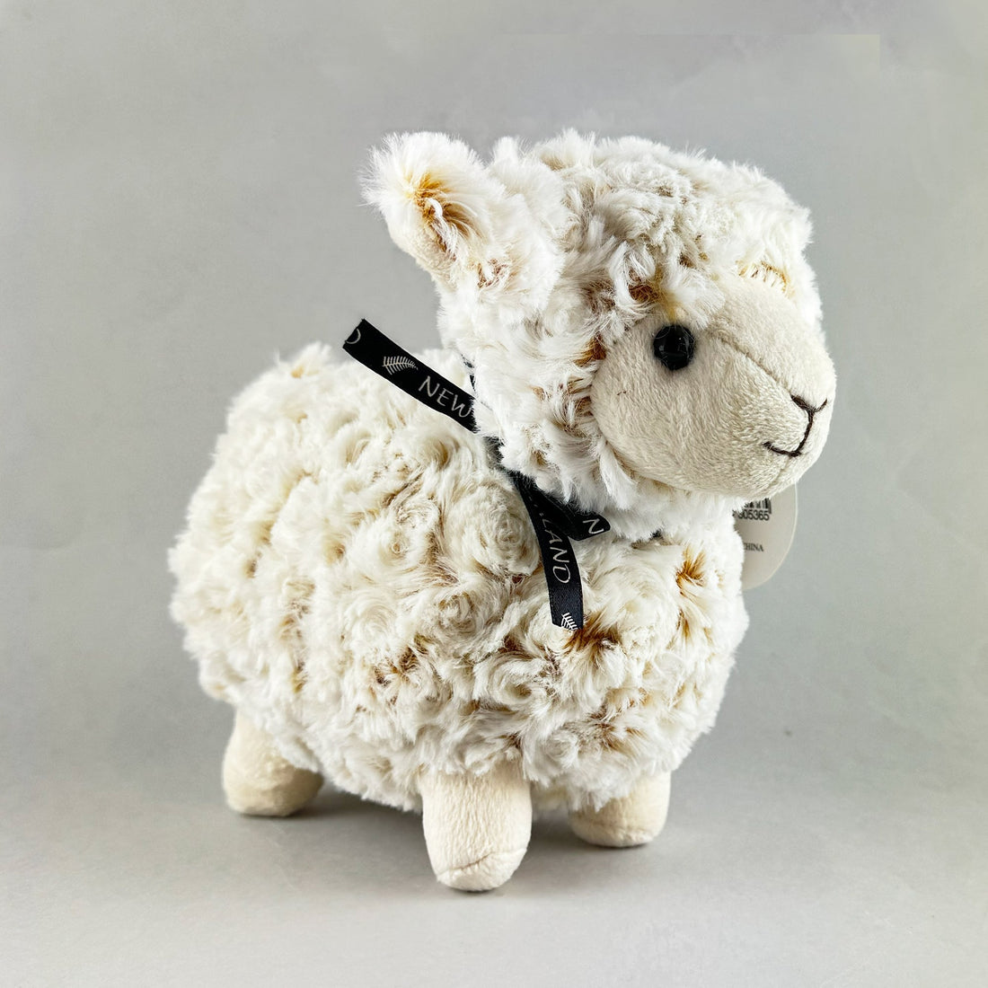 Cute Standing Sheep Soft Toy with Black Ribbon and Curly Fleece - ShopNZ