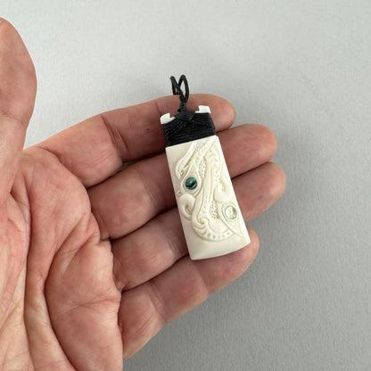 Finely Carved Maori Toki Manaia Necklace - ShopNZ