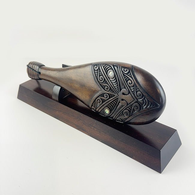 Mahogany Maori Patu with Stylised Wheku Face Carving and Optional Engraving and Gift Box - ShopNZ