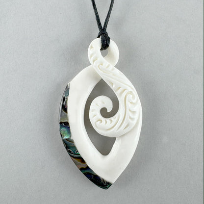 Maori Bone Twist Pendant with Inner Koru and Paua Trim - ShopNZ