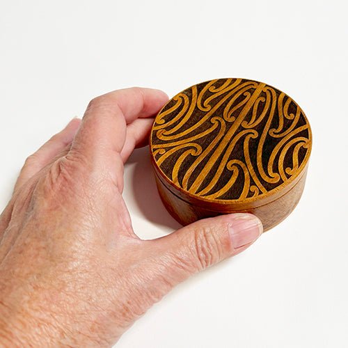 Round Rimu Box with Puhoro Maori Carving - ShopNZ