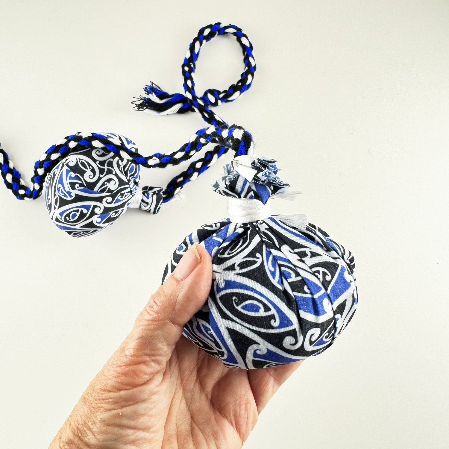 Set of Māori Poi with Blue White and Black Patterned Cover - ShopNZ