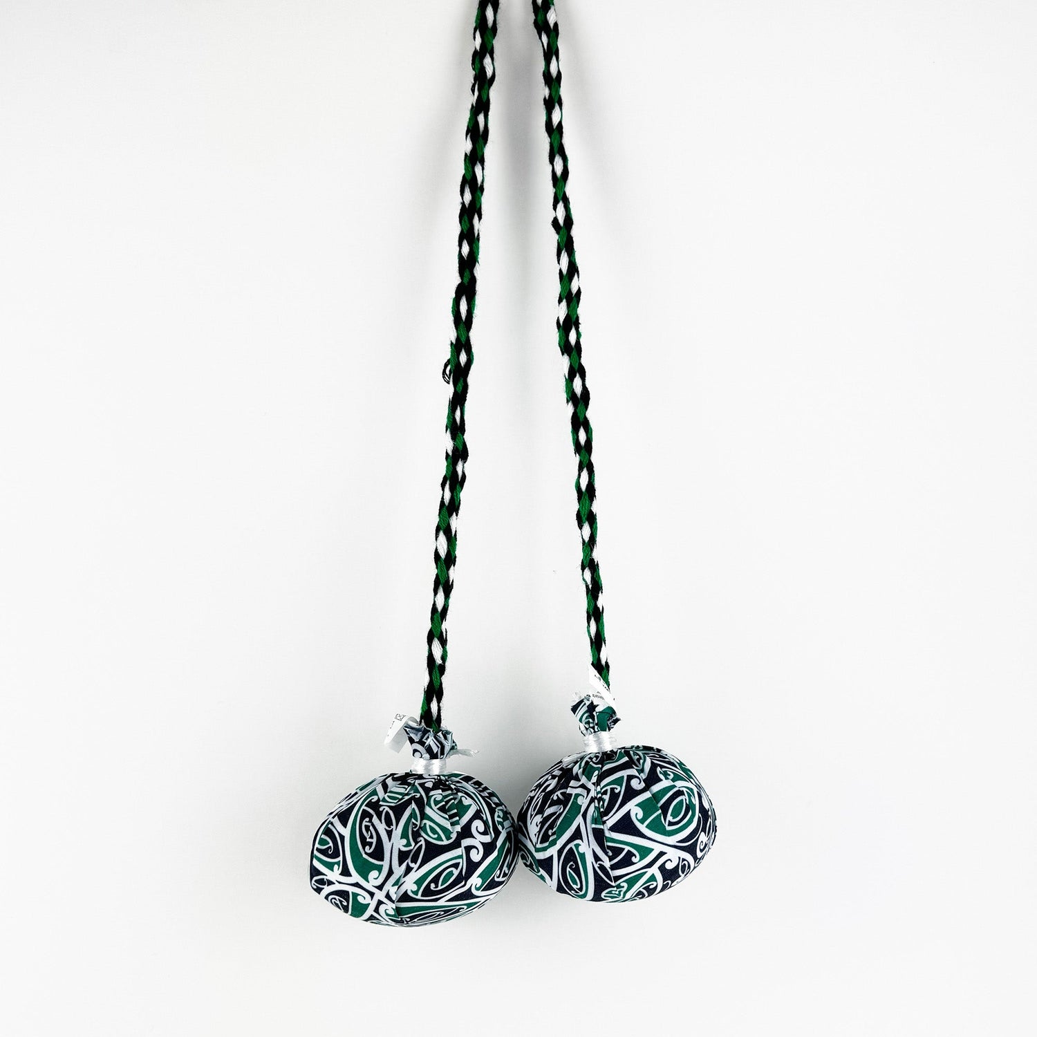 Set of Māori Poi with Green White and Black Patterned Cover - ShopNZ