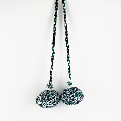 Set of Māori Poi with Green White and Black Patterned Cover - ShopNZ