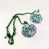 Set of Māori Poi with Green White and Black Patterned Cover - ShopNZ
