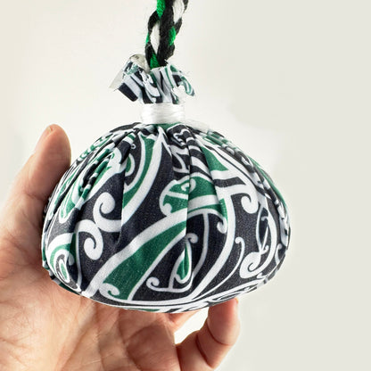 Set of Māori Poi with Green White and Black Patterned Cover - ShopNZ