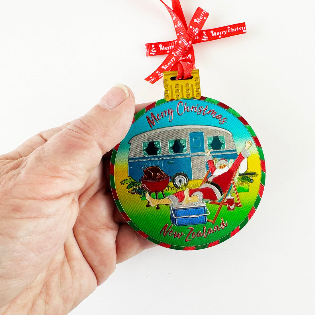 Shiny Foil NZ Christmas Ornament of Santa Claus Beside His Caravan Barbecue and Chilly Bin - ShopNZ