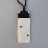Finely Carved Maori Toki Manaia Necklace - ShopNZ