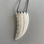 Intricately Carved Maori Bone Necklace In The Shape Of A Shark's Tooth