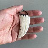 Intricately Carved Maori Bone Necklace In The Shape Of A Shark's Tooth - ShopNZ