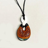 Maori Bone and Wood Love Twist Necklace with Paua Shell - ShopNZ