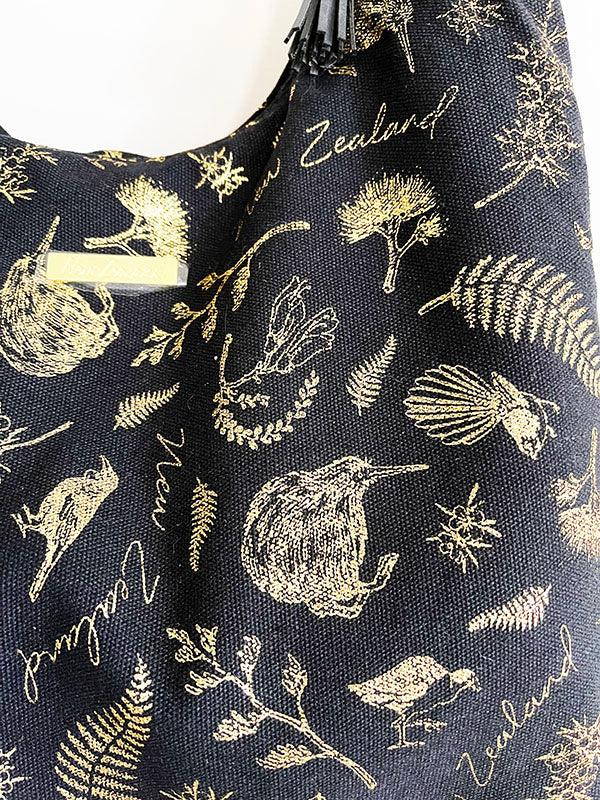 Black Slouch Shoulder Bag with Shiny Gold NZ Birds and Flora - ShopNZ