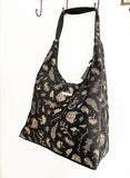 Black Slouch Shoulder Bag with Shiny Gold NZ Birds and Flora - ShopNZ