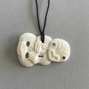 Intricately Carved Cow Bone Maori Tiki Necklace - ShopNZ